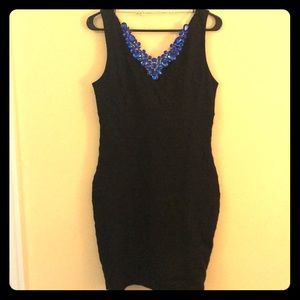 Size medium form fitting stretch black dress